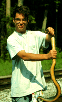 Frank Burbrink holding a snake